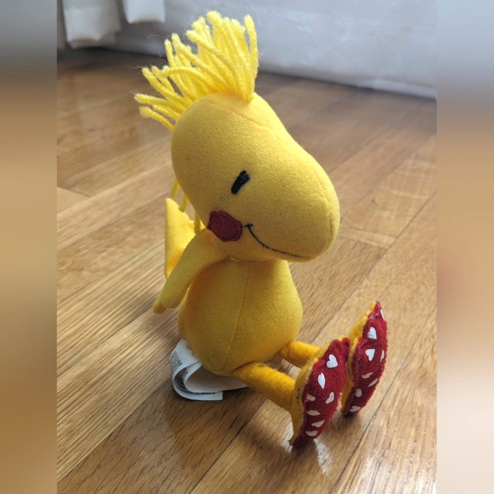 Peanuts Woodstock Stuffed Character. Kiss on cheek and hearts on feet.